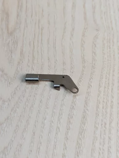 REMINGTON RM380 - LEVER SLIDE STOP NICKEL